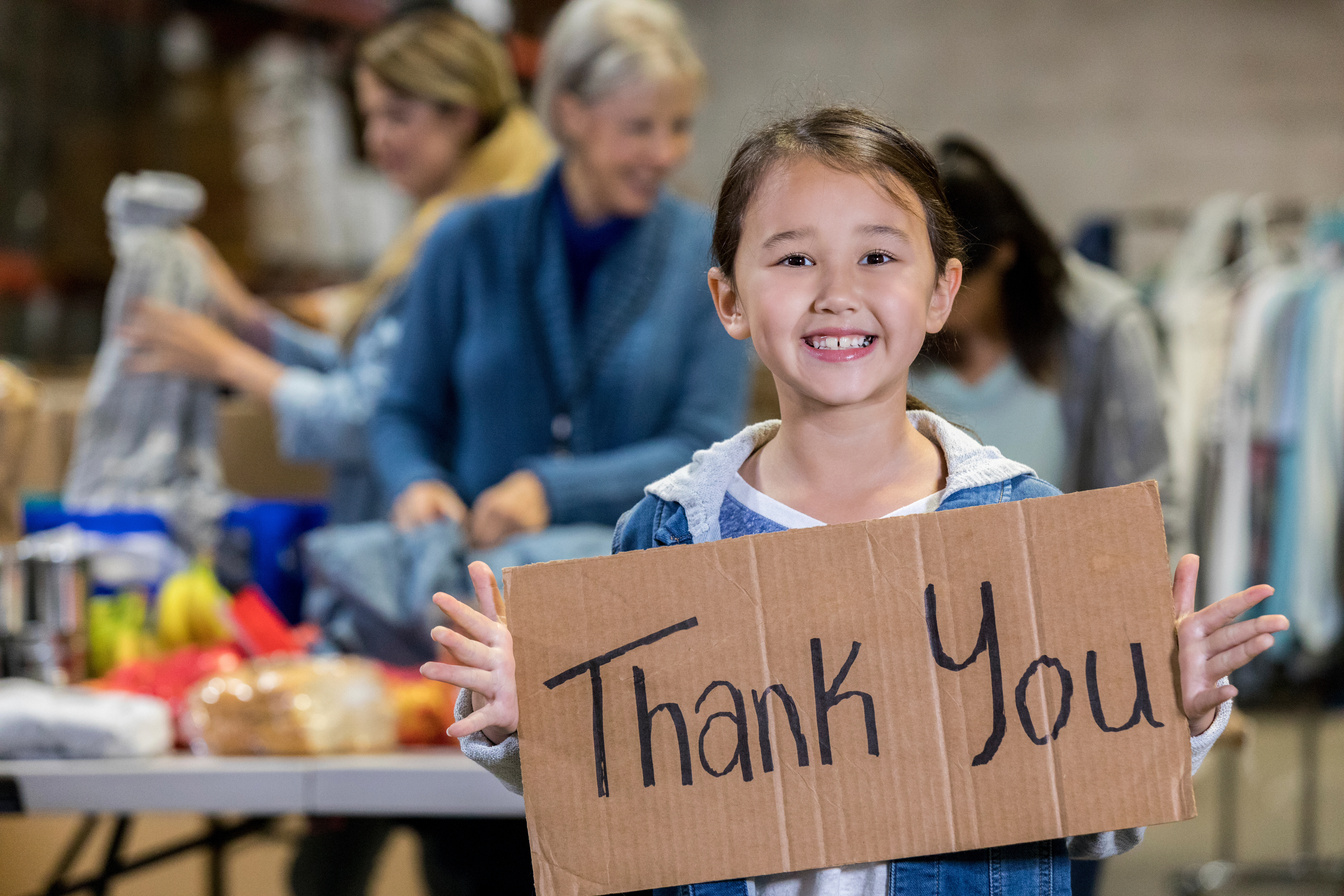 Little girl says thank you to food bank volunteers
